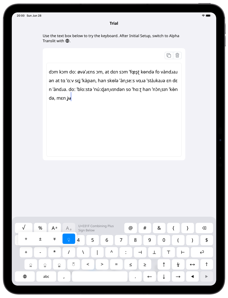 Alpha Translit app input screen (iPad, Symbols layout)